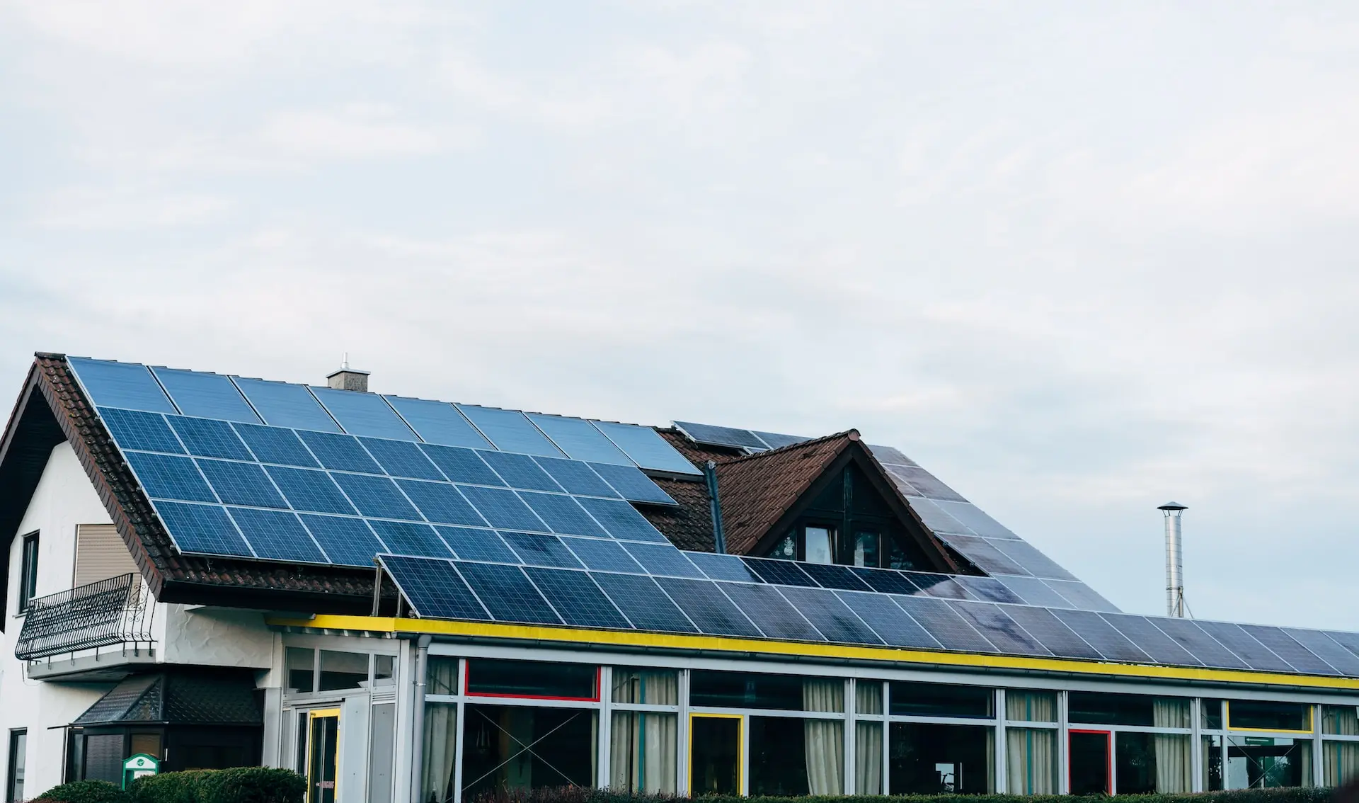 a house with solar panels on the roof